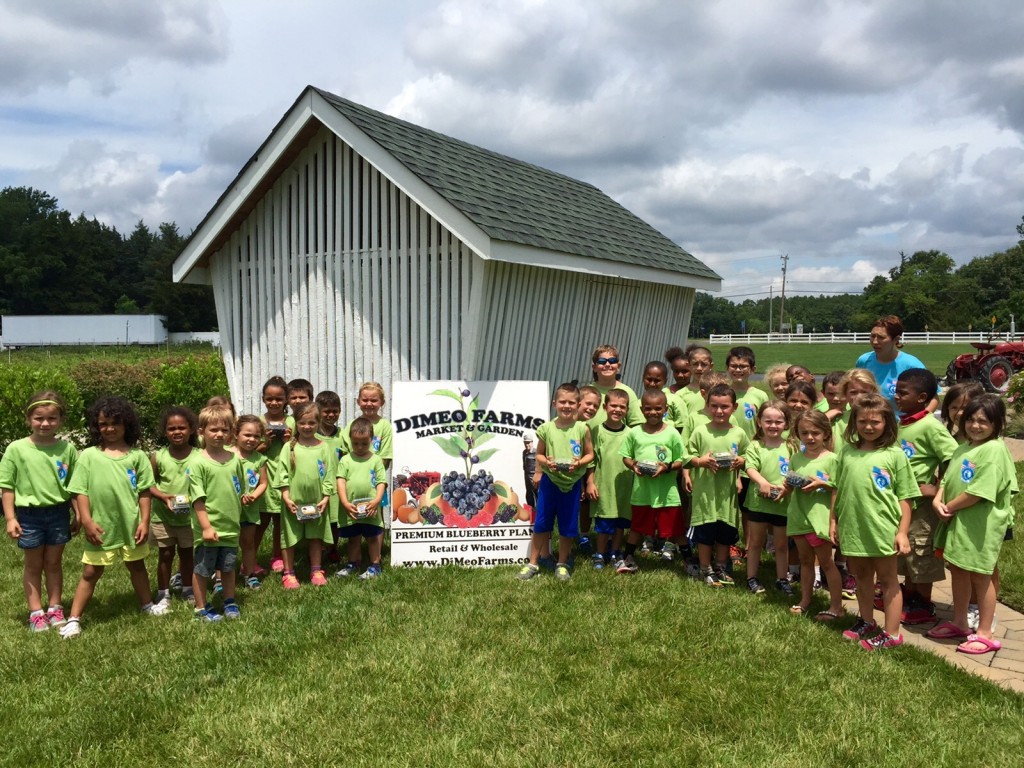 Kids love blueberry picking at DiMeo's Blueberry Farm in Hammonton, New Jersey